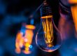 selective focus photography of clear light bulb